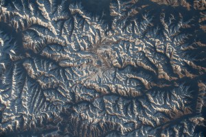 iss070e029134 (Nov. 21, 2023) -- As the International Space Station soared 260 miles above central Asia, the Karakoram mountain creates a root-like appearance. As one of the world's most geologically active areas, the system extends more than 300 miles (~500 km).