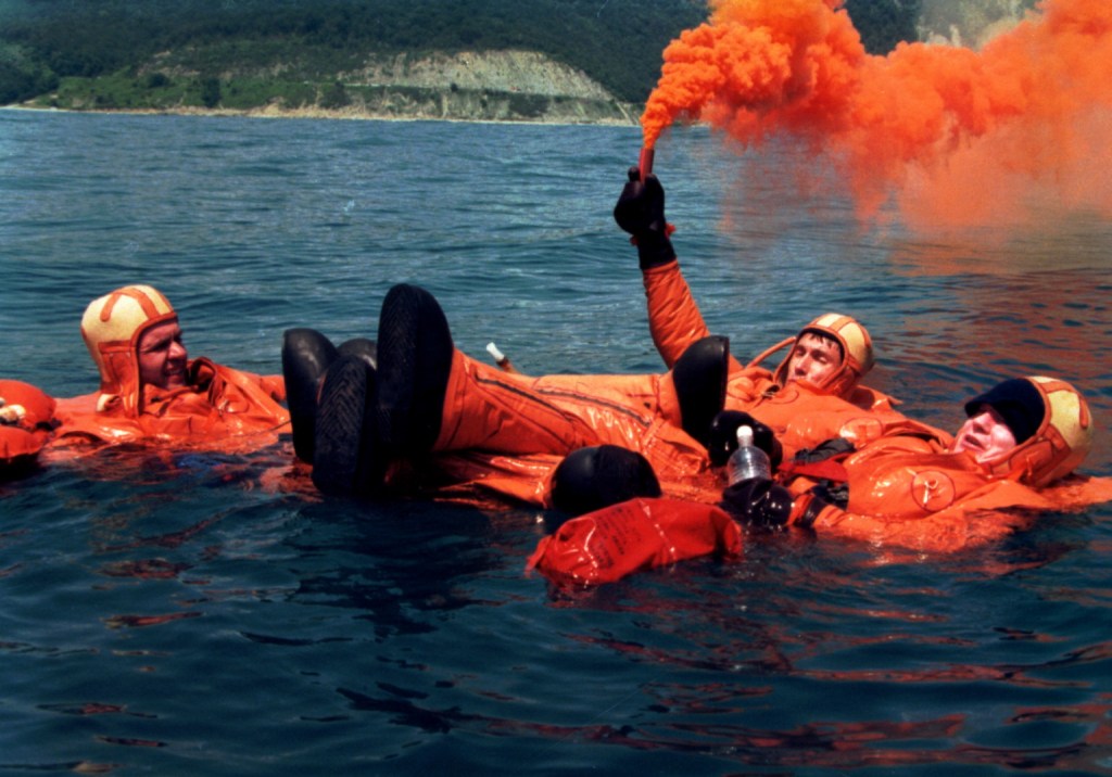 The first International Space Station crew, from left Soyuz Commander Yuri Gidzenko, Flight Engineer Sergei Krikalev and International Space Station Commander Bill Shepherd, practice water survival skills in the Black Sea recently. The skills would be needed in the event a Soyuz spacecraft landed in the water rather than on land as is normal. The crew is scheduled to launch to the new station in January 1999 aboard a Russian Soyuz spacecraft.