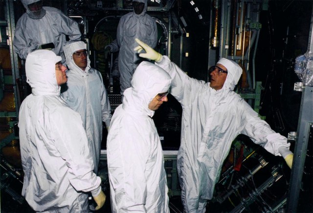 Members of the first crew of the International Space Station from left, ISS Commander astronaut Bill Shepherd, ISS Flight Engineer cosmonaut Sergei Krikalev and Soyuz Commander cosmonaut Yuri Gidzenko inspect the station's Node 1 as it nears completion of construction at the Marshall Space Flight Center in Huntsville, Al. in May 1997. In June 1998, Node 1 will become the first U.S.-built station component to be launched and will be an integral portion of the station when the crew arrives on board in January 1999. The crew has been in training for the mission since late 1996 with training segments held in both the U.S. and Russia.