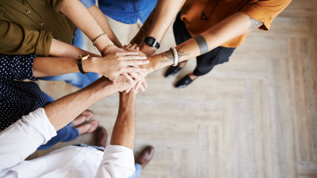 vision for strategic plan a group of people putting their hands together in a circle