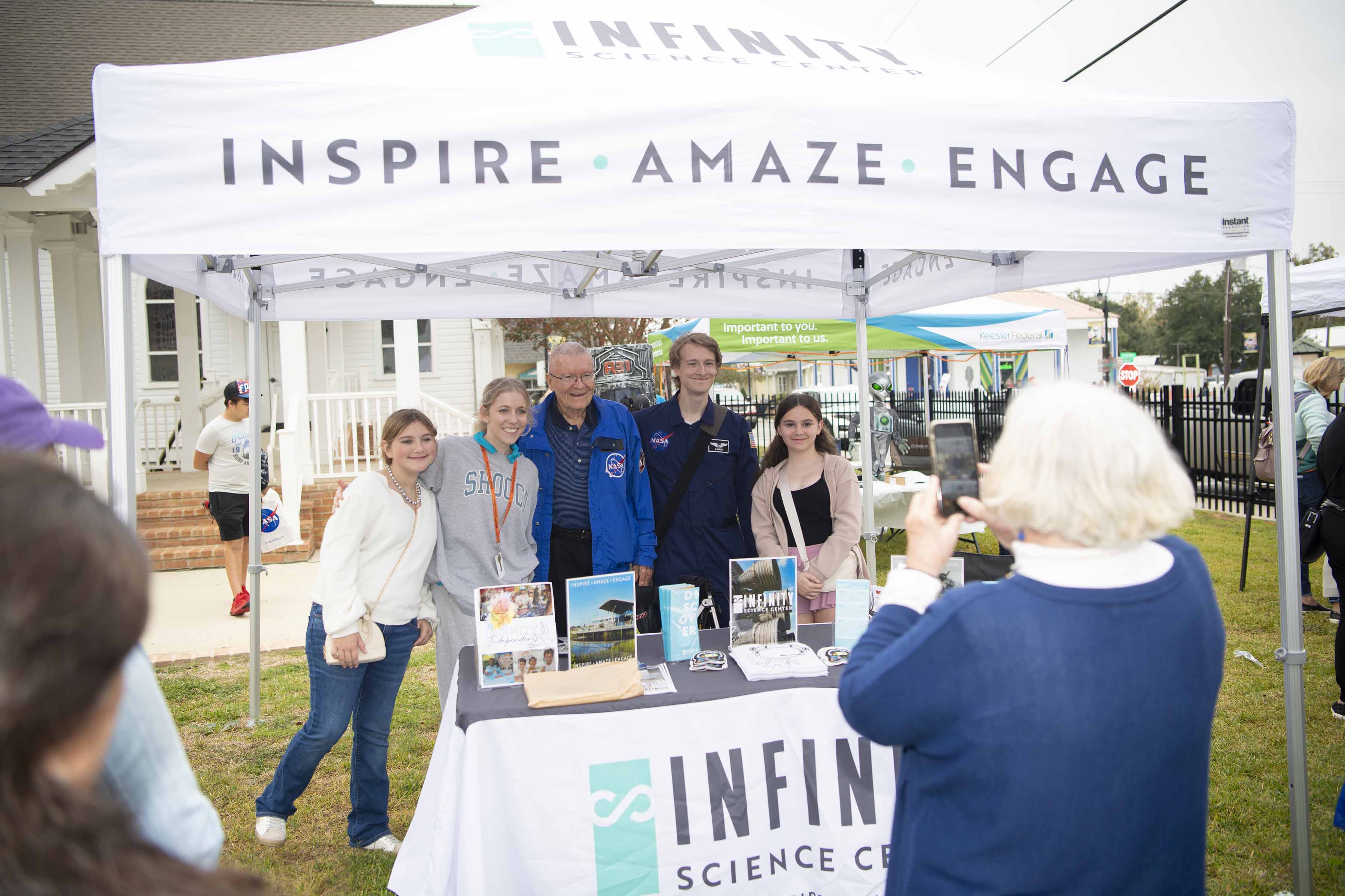 Fred Haise gets an early birthday celebration at Stennis Day in the Bay