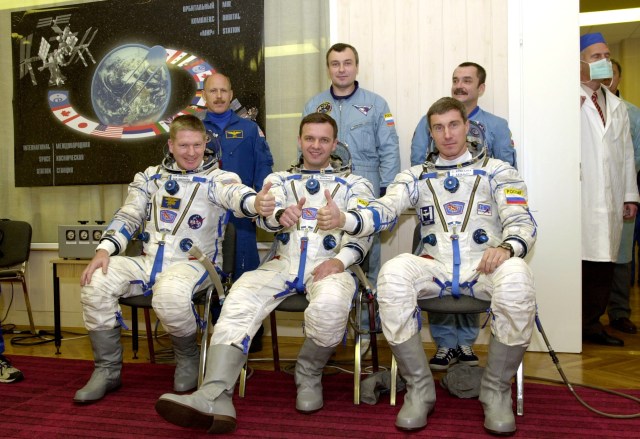Appearing ready for their rapidly-approaching date with the International Space Station (ISS) are (seated, from the left) astronaut William M. Shepherd, Expedition 1 commander; with cosmonauts Yuri P. Gidzenko, Soyuz commander; and Sergei K. Krikalev, flight engineer. Behind them are the backup crewmembers (from left) -- astronaut Kenneth D. Bowersox with cosmonauts Vladimir N. Dezhurov and Mikhail Turin.