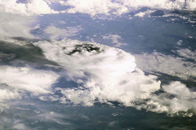 A mass of storm clouds was captured with an electronic still camera (ESC) from the International Space Station (ISS) by the Expedition 1 crew members. The picture was the first Earth observation still image downlinked by the three-man crew.