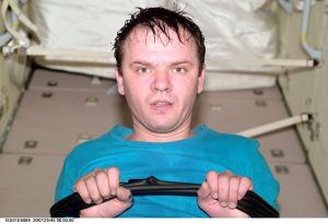 Cosmonaut Yuri P. Gidzenko, Expedition 1 Soyuz commander, works out in the Functional Cargo Block (FGB) or Zarya.