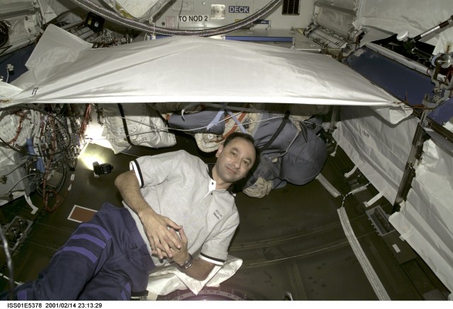 Astronaut Mark L. Polansky is pictured in the new Destiny laboratory. The STS-98 and Expedition One crews have been busy in the lab since its hatch was opened earlier in the week. This photo was taken with a digital still camera.