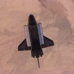This nadir image of the Space Shuttle Atlantis backdropped over a desert was photographed by the three-man Expedition One crew aboard the International Space Station (ISS) shortly after the shuttle and the outpost unlinked following several days of joint operations of the two crews. The scene was recorded with a digital still camera.