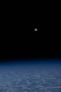 The Full Moon is pictured from the International Space Station as it orbited 271 miles above a cloudy south Indian Ocean half-way between Australia and Antarctica.