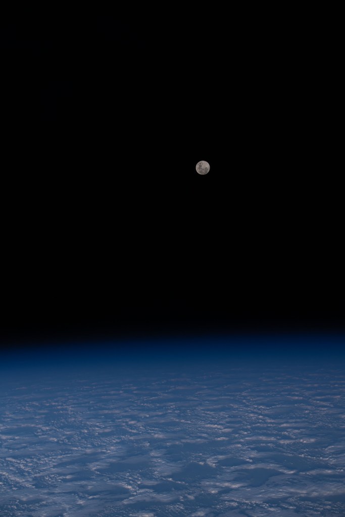 The Full Moon is pictured from the International Space Station as it orbited 271 miles above a cloudy south Indian Ocean half-way between Australia and Antarctica.