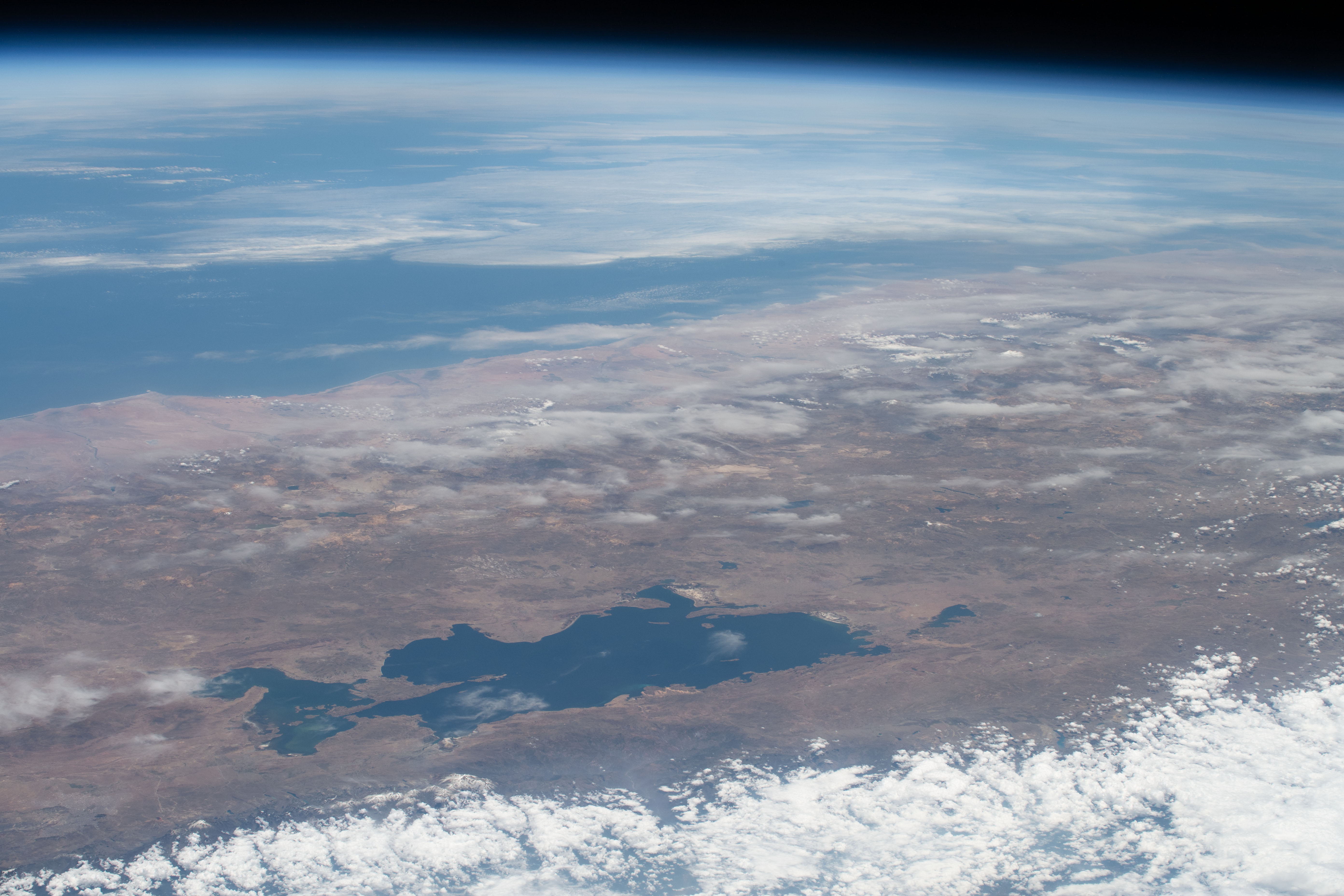 Lake Titicaca, a freshwater lake nestled in between Peru and Bolivia in the Andes Mountains, is pictured from the International Space Station as it orbited 261 miles above the South American continent.