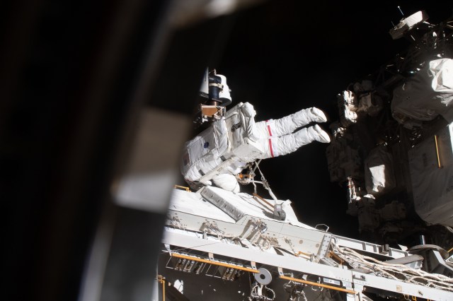 NASA astronaut and Expedition 70 Flight Engineer Jasmin Moghbeli is pictured tethered to the International Space Station during a spacewalk to replace one of the 12 trundle bearing assemblies on the port solar alpha rotary joint, which allows the arrays to track the Sun and generate electricity to power the station.