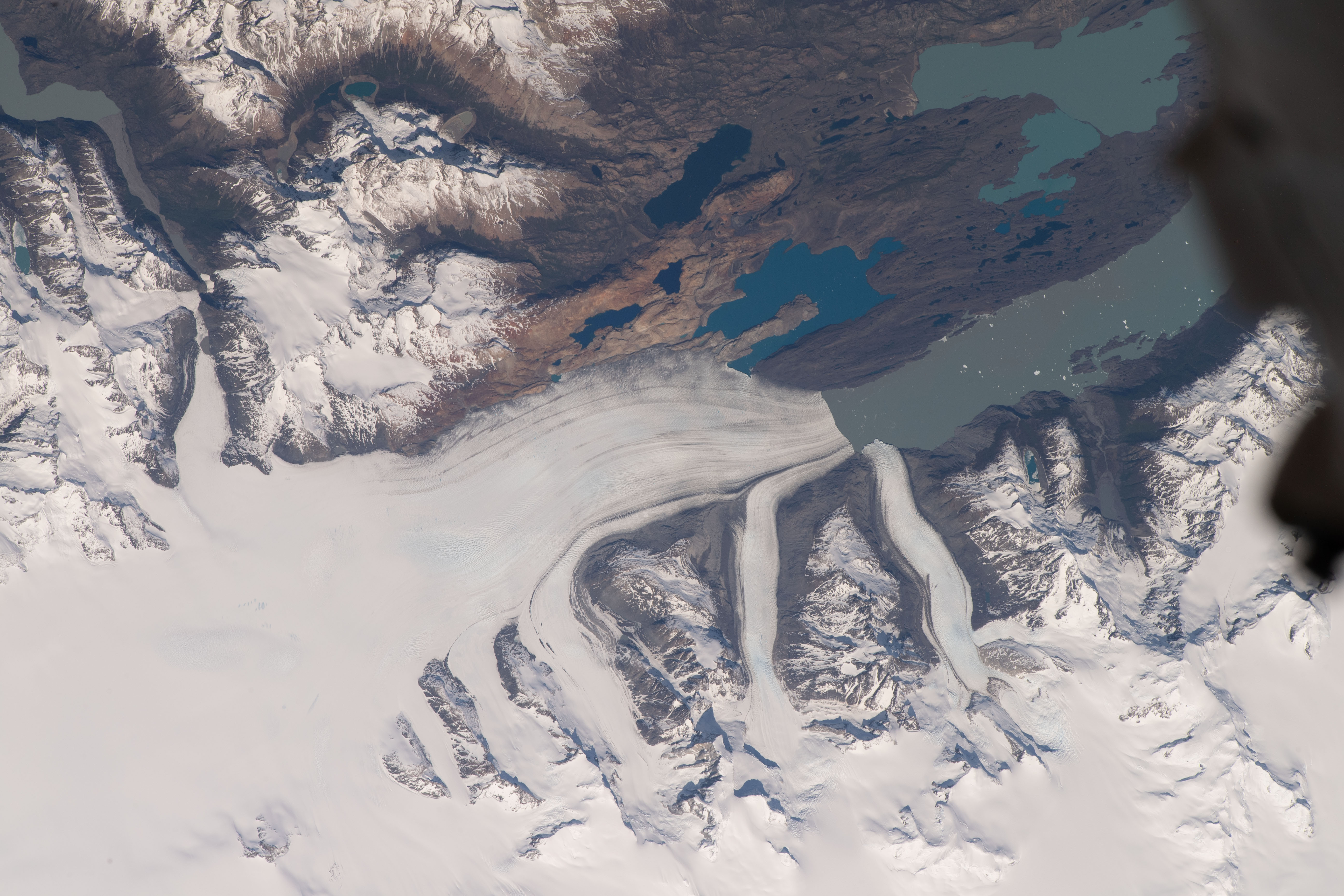 Upsala Glacier, in between Chile and Argentina, flows into Lago Argentina in this photograph from the International Space Station as it orbited 270 miles above.