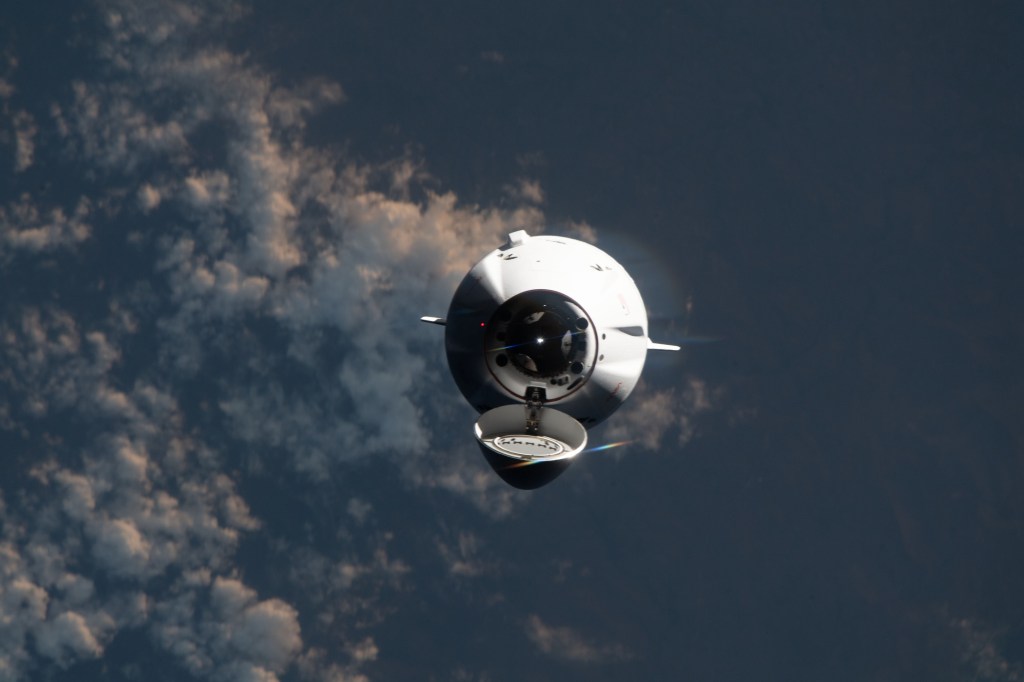 The SpaceX Dragon cargo craft, on the company's 29th commercial resupply mission for NASA, approaches the International Space Station while orbiting 261 miles above Indonesia's Savu Sea.