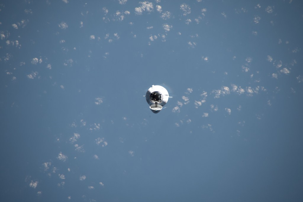 The SpaceX Dragon cargo spacecraft, on the company's 29th commercial resupply mission for NASA, approaches the International Space Station while orbiting 261 miles above the Indian Ocean in between Australia and Indonesia.