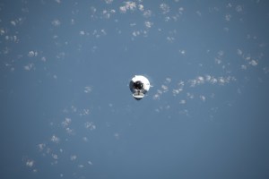 The SpaceX Dragon cargo spacecraft, on the company's 29th commercial resupply mission for NASA, approaches the International Space Station while orbiting 261 miles above the Indian Ocean in between Australia and Indonesia.