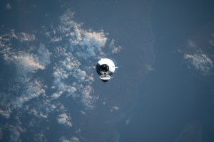 The SpaceX Dragon cargo spacecraft, on the company's 29th commercial resupply mission for NASA, approaches the International Space Station while orbiting 261 miles above the Lesser Sunda Islands.