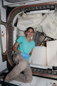 NASA astronaut and Expedition 70 Flight Engineer Jasmin Moghbeli works in the International Space Station's Tranquility module clearing hardware and making space inside the NanoRacks Bishop airlock.