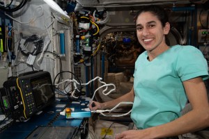 NASA astronaut and Expedition 70 Flight Engineer Jasmin Moghbeli works in the Harmony module and calibrates an ultrasonic inspection device that uses high-frequency sound waves to analyze materials aboard the International Space Station.