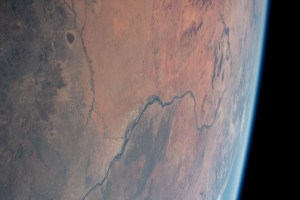 This view of Earth shows the White Nile River leading to the Nile River and winding through the African nation of Sudan. The dark spot at top left, is the Jebel Al Dair National Park containing a variety of mountains in the southern portion of Sudan.