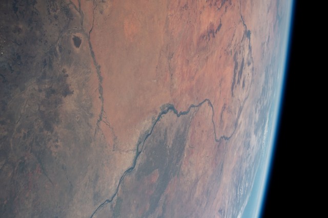 This view of Earth shows the White Nile River leading to the Nile River and winding through the African nation of Sudan. The dark spot at top left, is the Jebel Al Dair National Park containing a variety of mountains in the southern portion of Sudan.