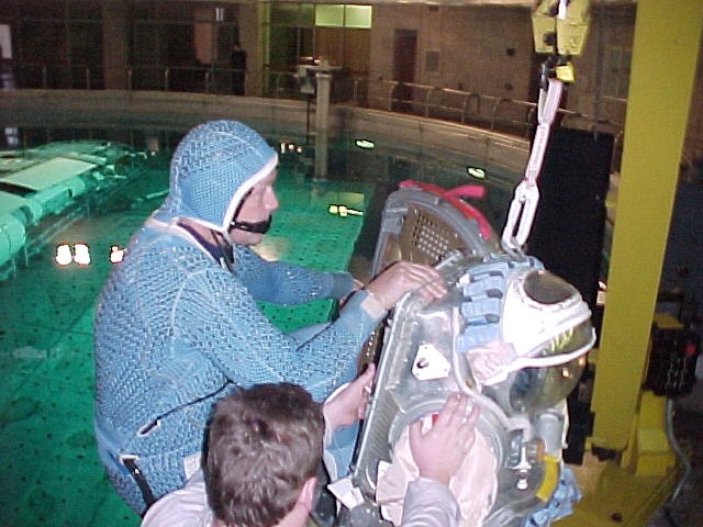 Astronaut William M. Shepherd, Expedition 1 commander, prepares to don an Orlan space suit in order to rehearse a spacewalk in the Hydrolab facility at the Gagarin Cosmonaut Training Center in Star City, Russia.