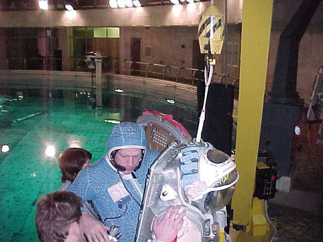 Astronaut William M. Shepherd, Expedition 1 commander, prepares to don an Orlan space suit in order to rehearse a spacewalk in the Hydrolab facility at the Gagarin Cosmonaut Training Center in Star City, Russia.