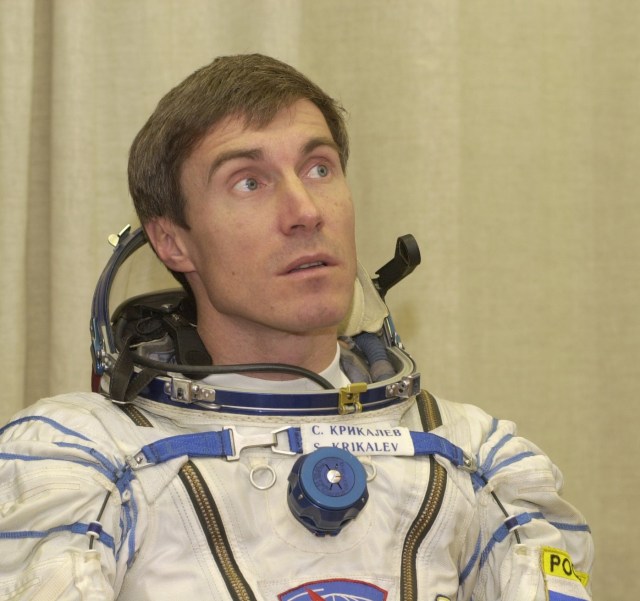 Expedition 1 flight engineer Sergei K. Krikalev, wearing a Sokol suit, will soon join his crew mates in entering the Soyuz spacecraft for a "dry run" at Baikonur. Out of frame are Expedition 1 commander William M. (Bill) Shepherd and Soyuz commander Yuri P. Gidzenko.