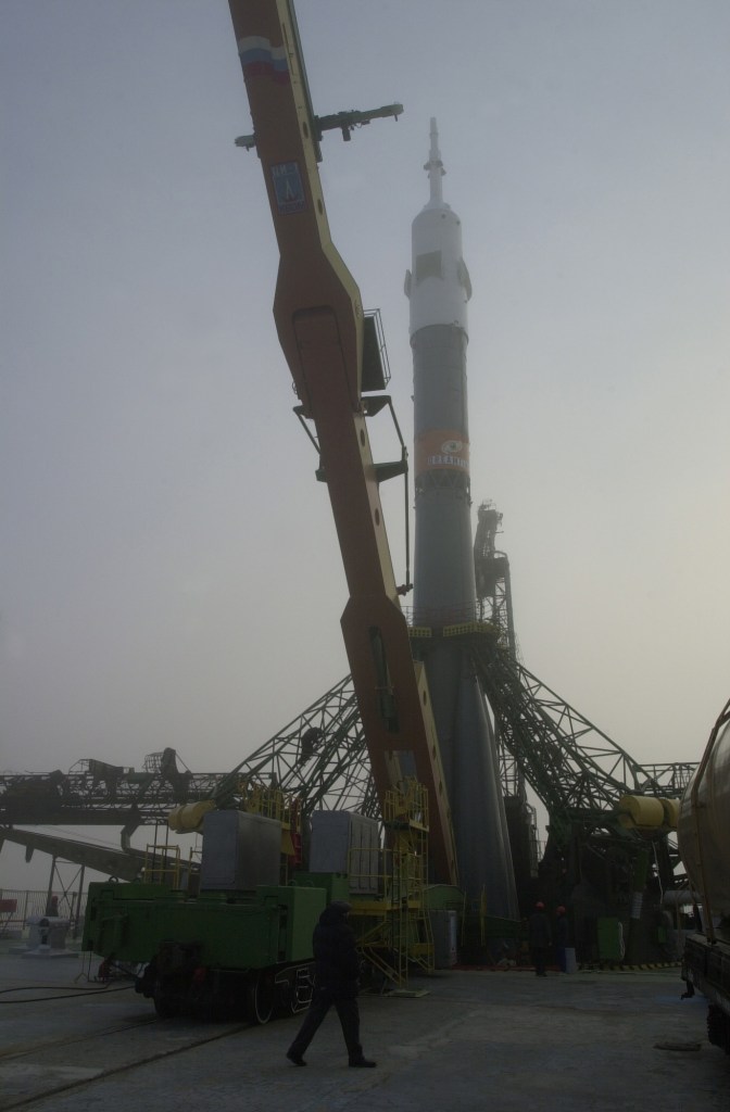 Giant machinery at the launch pad at Baikonur works to position the Soyuz rocket in readiness for the Expedition 1 crew's launch in two days.