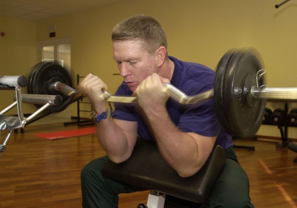 Just two days away from his scheduled launch aboard a Soyuz spacecraft from Kazakhstan, astronaut William M. (Bill) Shepherd exercises with weights. The Expedition 1 commander also worked out on a treadmill device and spent time on other equipment in the gym on this Sunday afternoon.