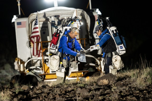 Japan Aerospace Exploration Agency (JAXA) astronaut Akihiko "Aki" Hoshide (left) and a JAXA engineer collect geology samples during NASA's Desert Research and Technology Studies (D-RATS) analog mission in Arizona.