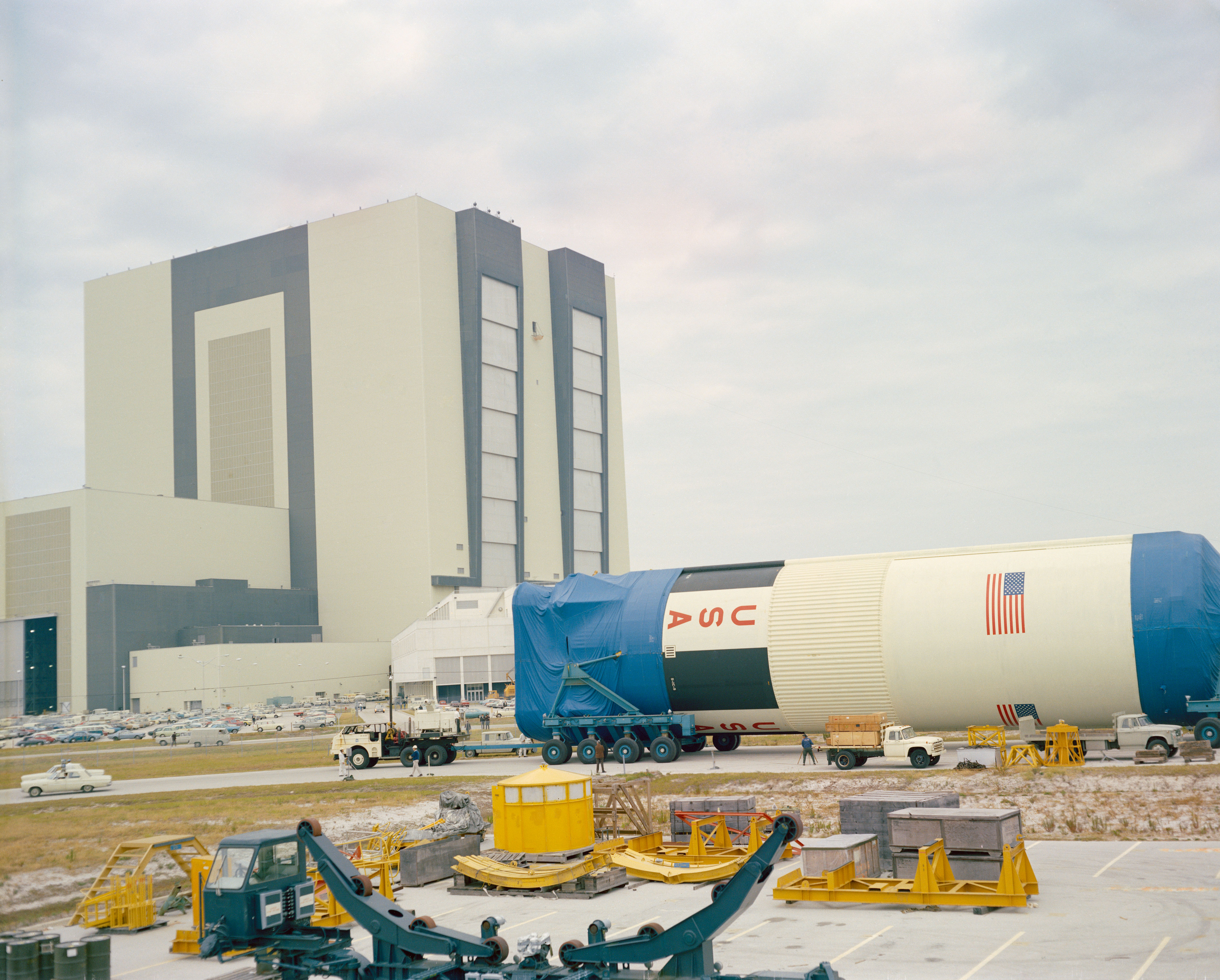 Photo of the Apollo 10 S-IC first stage arrives at KSC’s Vehicle Assembly Building (VAB).