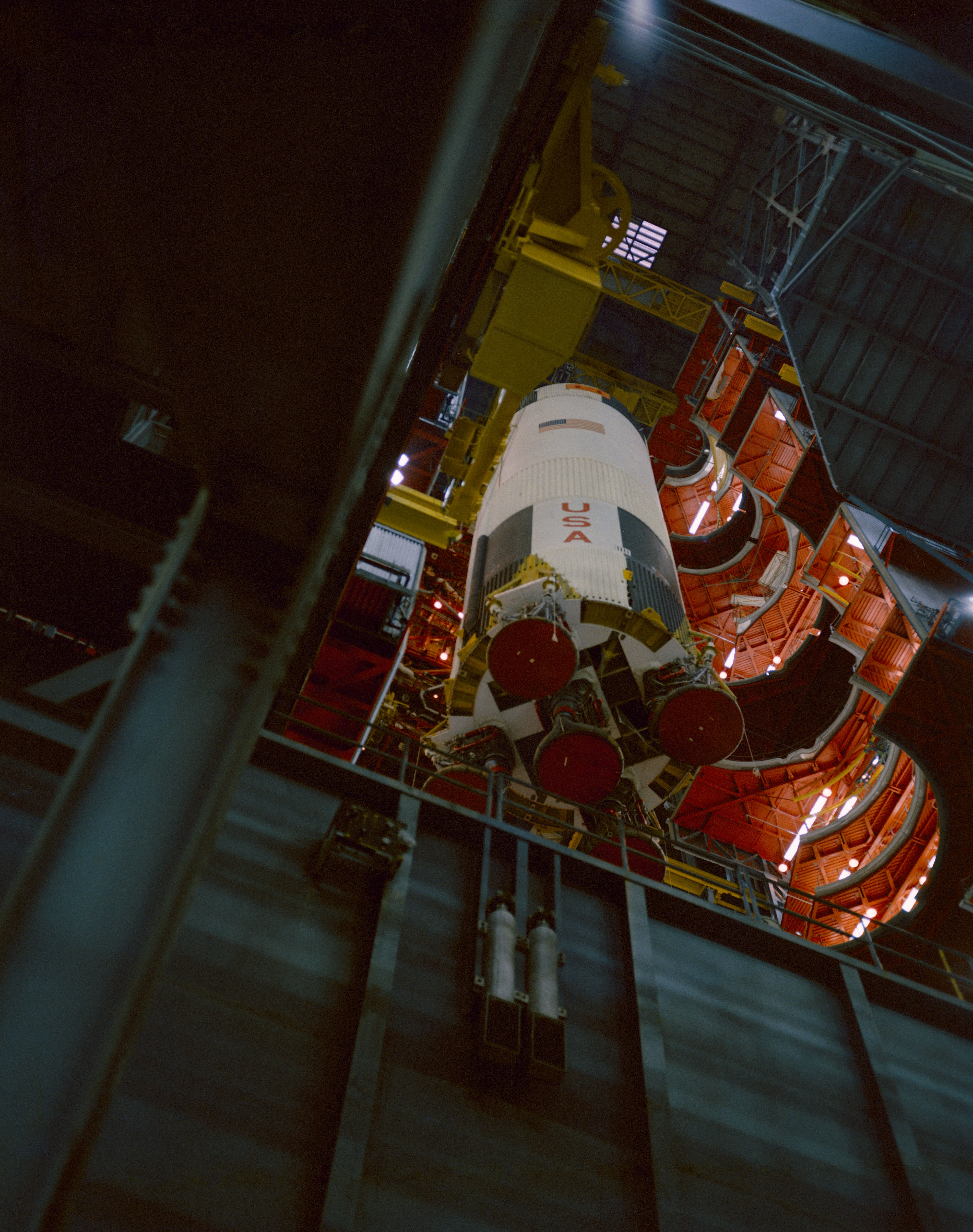 Workers in the VAB stack the Apollo 10 first stage on its Mobile Launcher
