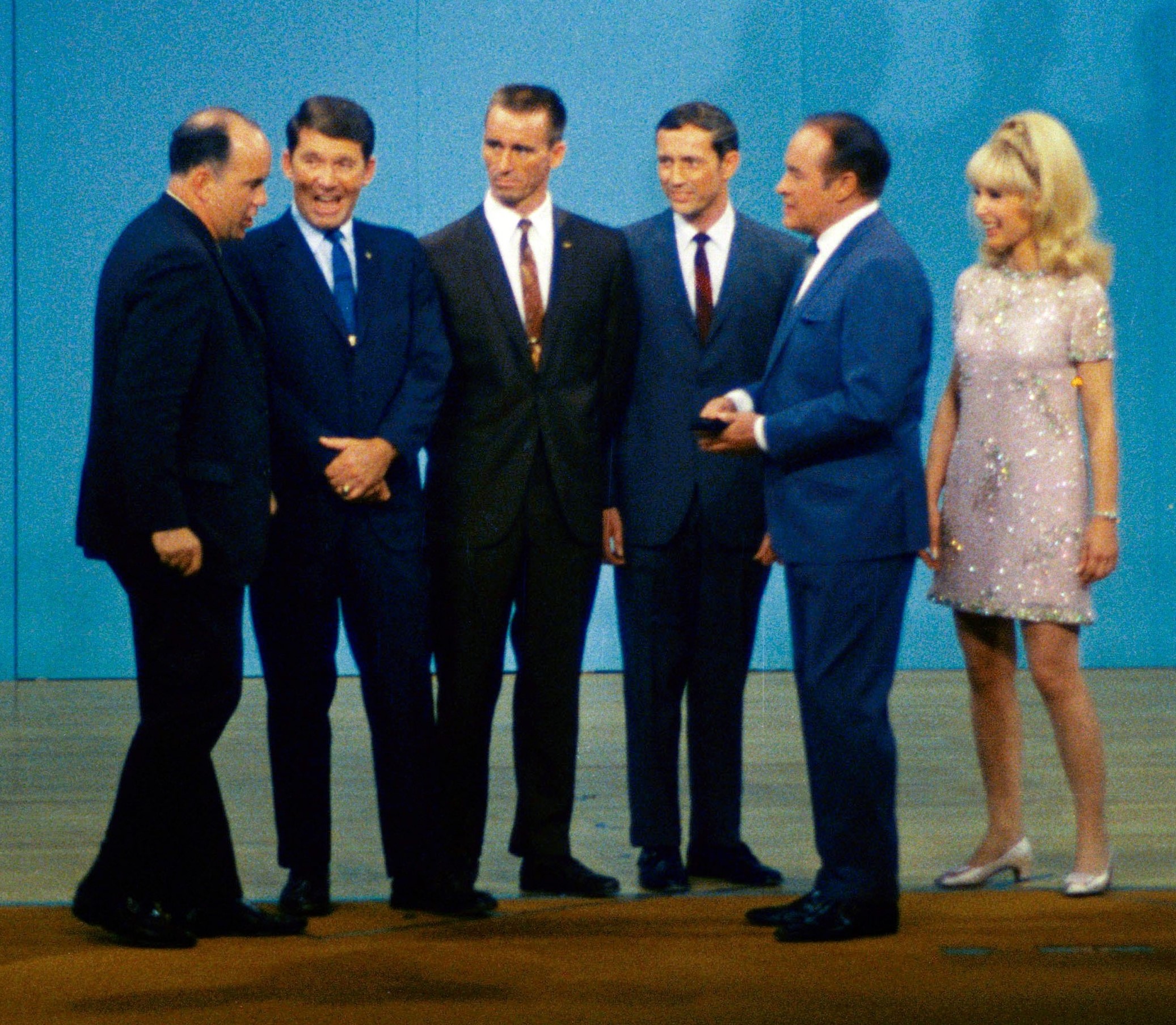 Entertainer Bob Hope, second from right, taped an episode of his show at the Manned Spacecraft Center, now NASA’s Johnson Space Center in Houston, with guests the “Voice of Mission Control” Paul P. Haney, left, Apollo 7 astronauts Schirra, Cunningham, and Eisele, and television star Barbara Eden
