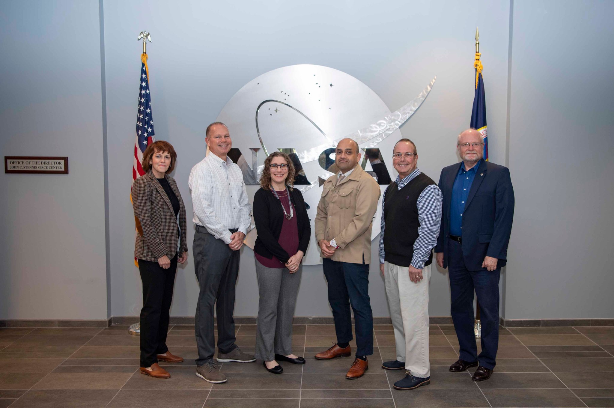 NASA Chief Technologist A.C. Charania (third from right) stands with NASA Stennis leaders during his first visit onsite