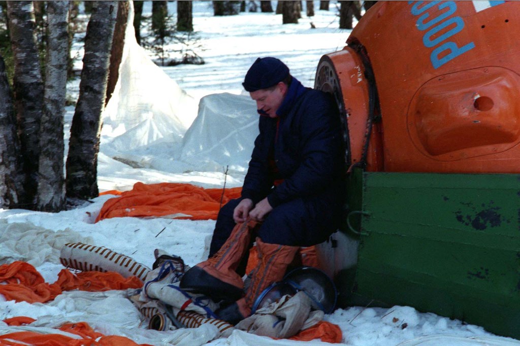 Astronaut Bill Shepherd, commander of the first crew that will live aboard the International Space Station, exits a mock Soyuz spacecraft during Soyuz winter survival training in March 1998 near Star City, Russia. Shepherd's crew includes Soyuz Commander Yuri Gidzenko and Flight Engineer Sergei Krikalev, both from Russia.