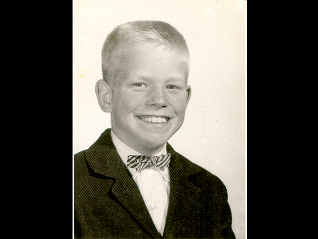An eight-year old Bill Shepherd in his school photo.