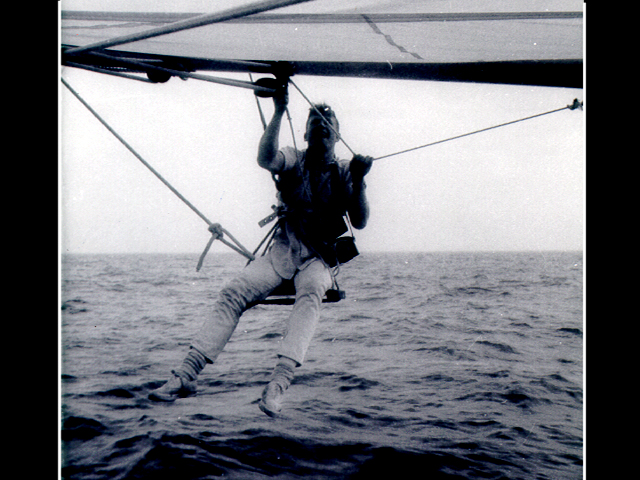 In an undated photo, Bill Shepherd crews on a sail boat.