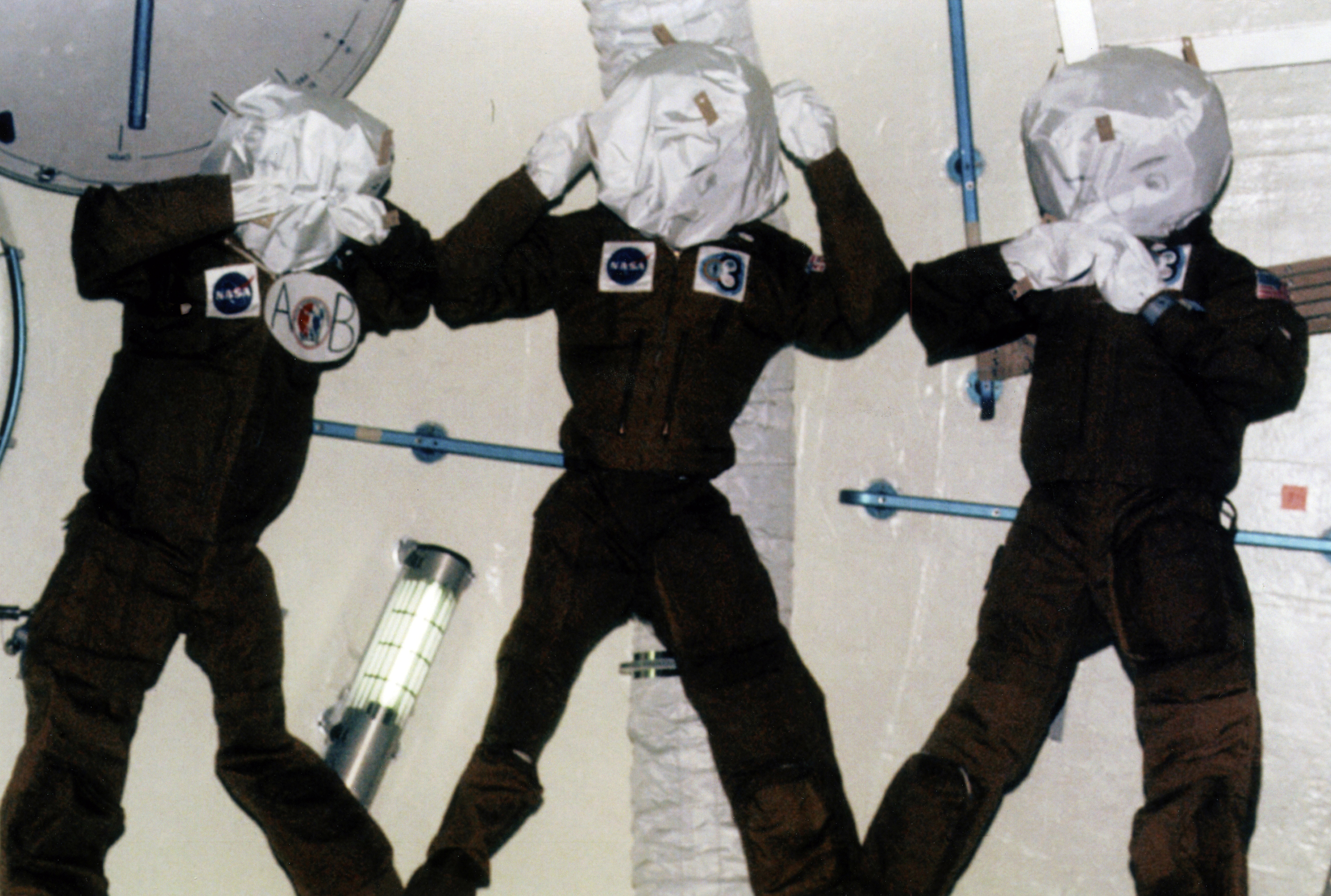 Breaking News Three astronaut manikins wear the Skylab 4 crew’s flight overalls