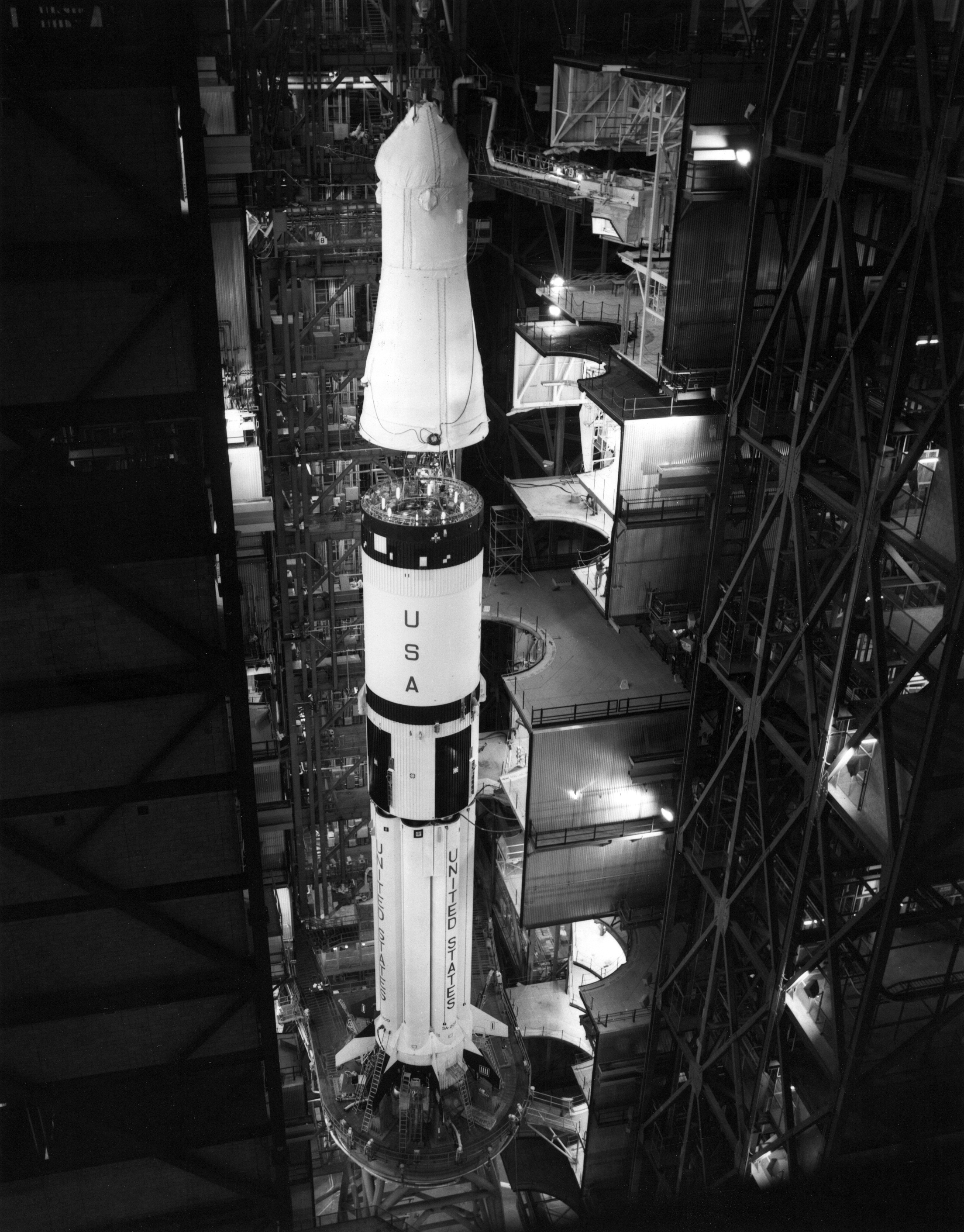 Breaking News Workers stack the Expose and Service Module CSM-119, the Skylab 4 rescue spacecraft, atop SA-209