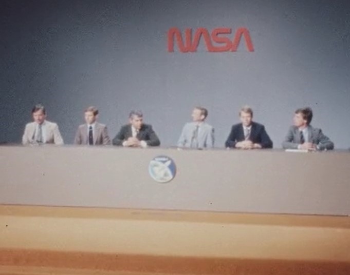 The STS-9 crew during their preflight press conference at NASA’s Johnson Space Center in Houston