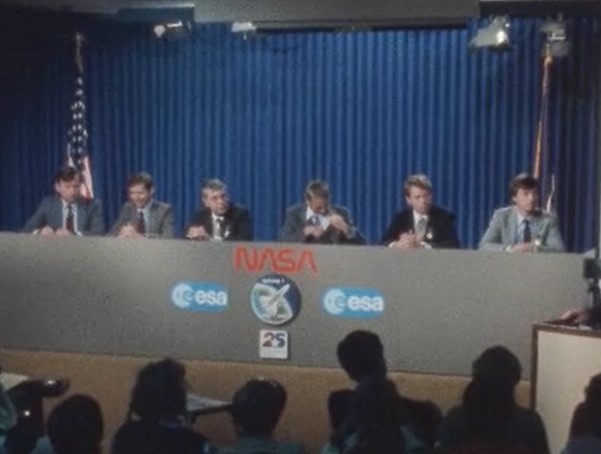 The STS-9 crew during their postflight press conference at NASA’s Johnson Space Center in Houston