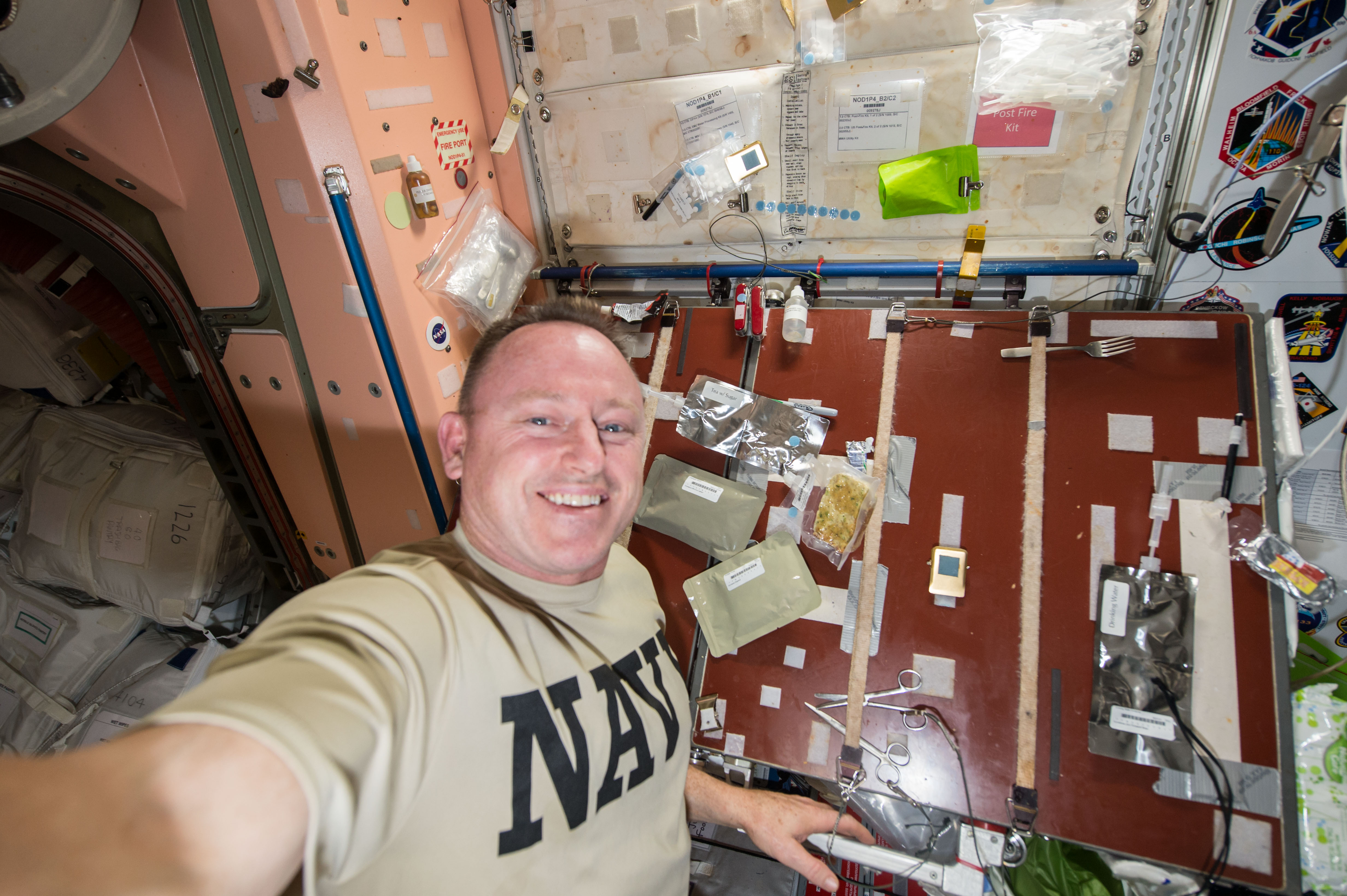 Expedition 42 commander and NASA astronaut Barry E. “Butch” Wilmore sets out his meal several days in advance