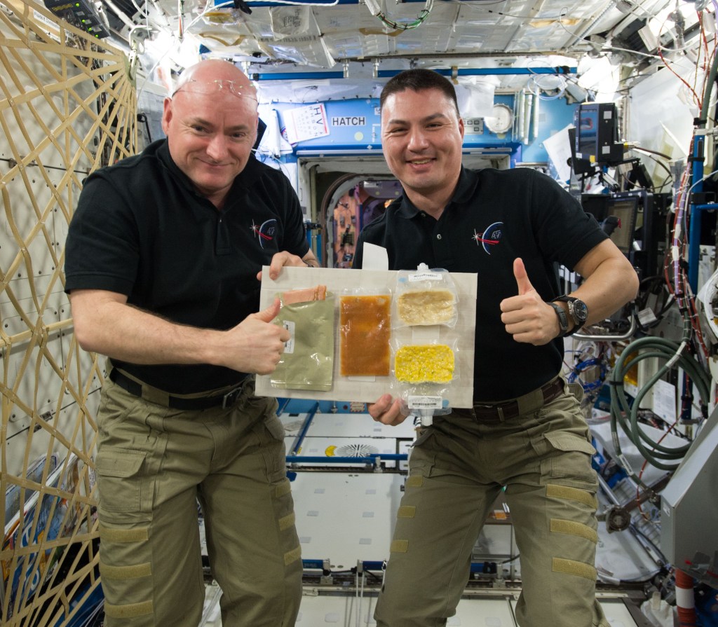 Kelly, left, and Lindgren show off the Thanksgiving dinner items
