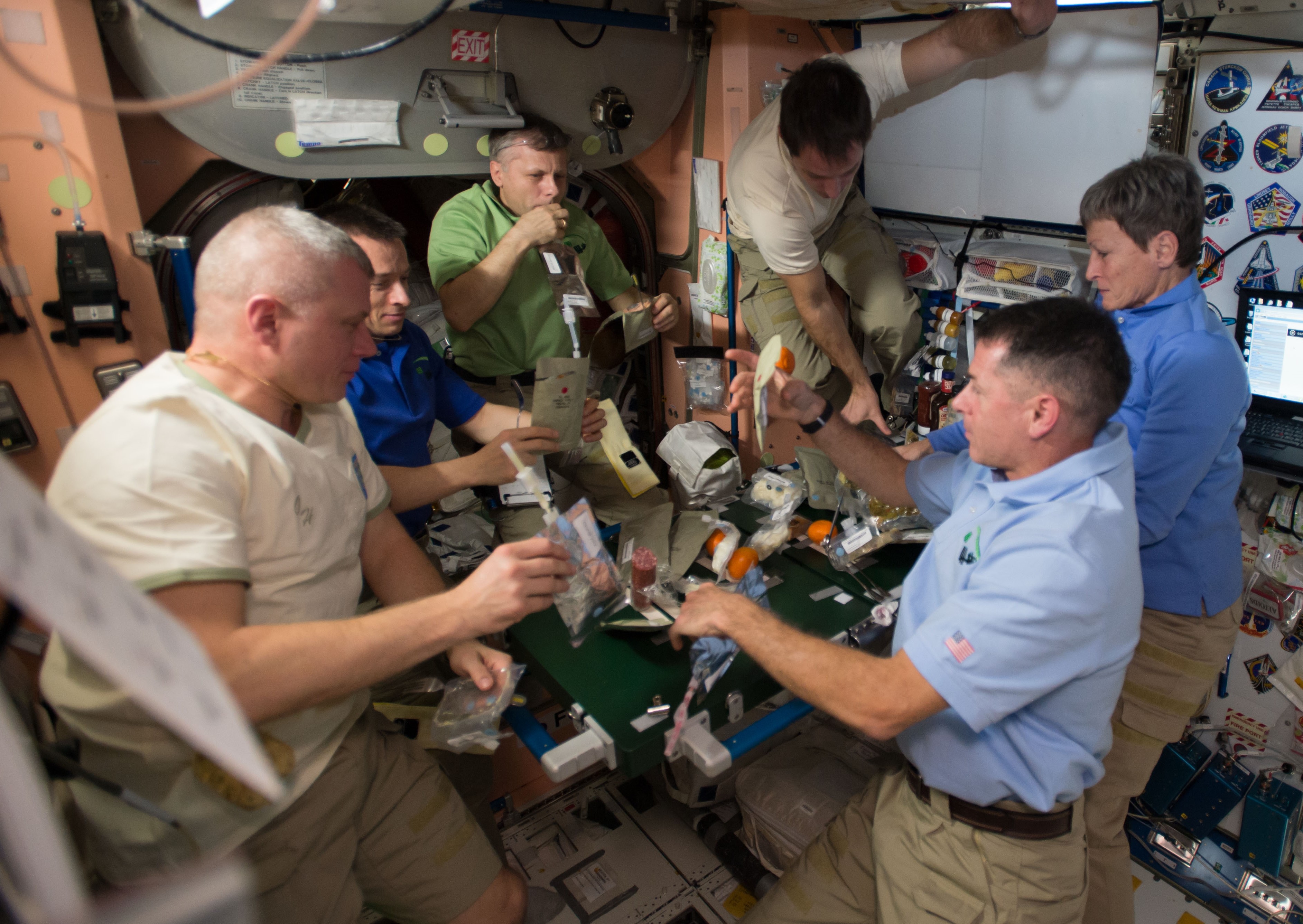 Image of the Expedition 50 crew enjoying Thanksgiving feast