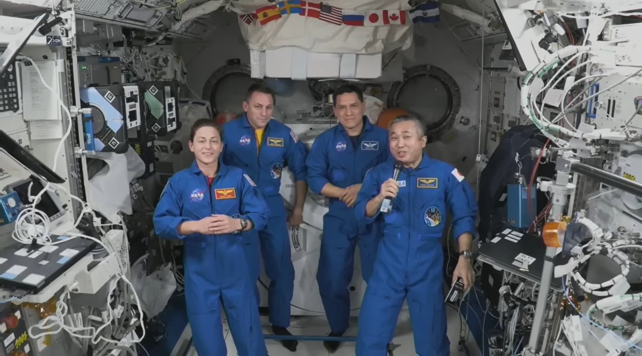 Expedition 68 crew members NASA astronauts Nicole A. Mann, left, Josh A. Cassada, and Francisco “Frank” C. Rubio, and Koichi Wakata of the Japan Aerospace Exploration Agency send Thanksgiving Day greetings