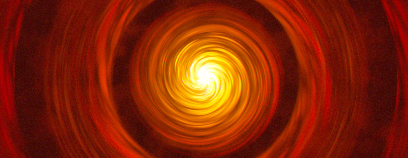 Banner Slice image taken out of artist’s concept compares two types of typical, planet-forming disks around newborn, Sun-like stars. On the left is a compact disk with no rings or gaps. On the right is an extended disk with rings and gaps. The compact disk is considerably smaller than the extended disk. Both the right and left illustrations have a bright yellow center indicative of a newly formed star. In both, the yellow center is surrounded by a swirling, orange disk. On the left, the compact disk appears unbroken by any gaps or rings. On the right, the extended disk features two, thick, mottled, orange rings surrounded by two, large, almost black gaps. The central portion of the extended disk has an outer region of orange surrounding a bright yellow center.