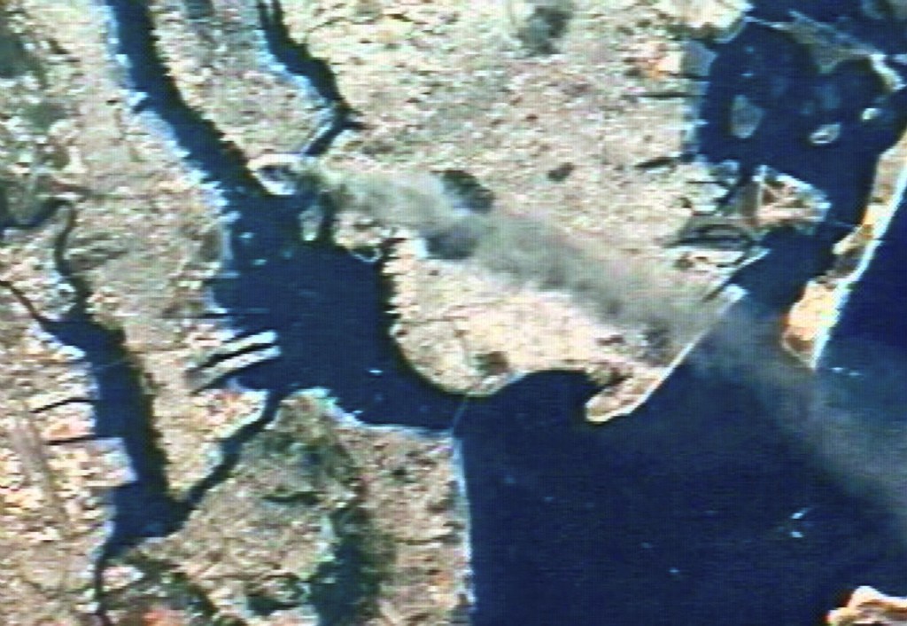 This still image, taken from video sent from the International Space Station on Tuesday, shows a smoke plume rising from the Manhattan area of New York City. This view was taken by Expedition Three Commander Frank Culbertson as the space station flew over New York at an altitude of approximately 250 miles. (This image has not yet been catalogued.)