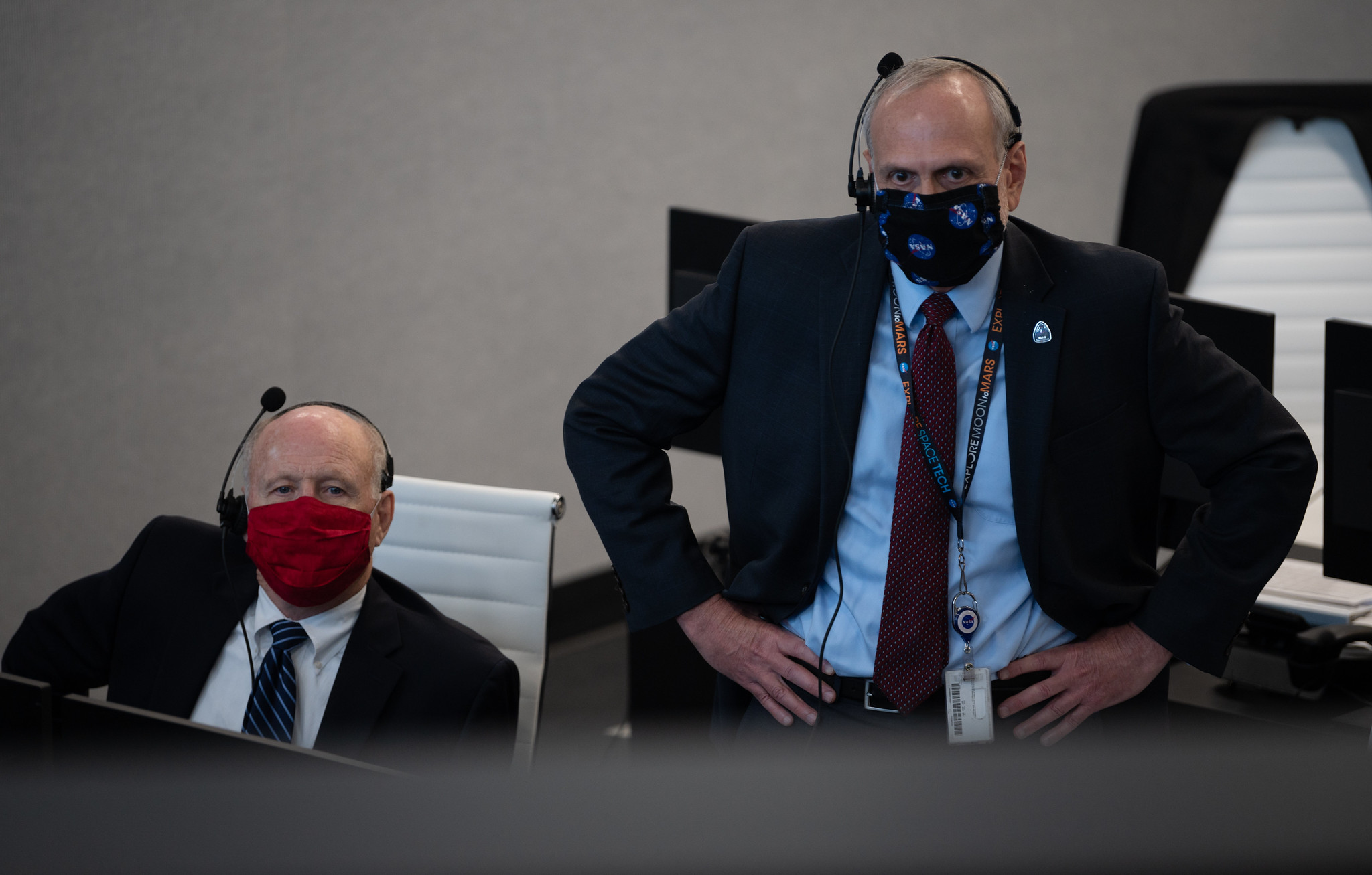 Ken Bowersox, left, and Steve Jurczyk monitor the launch of a SpaceX Falcon 9 rocket.