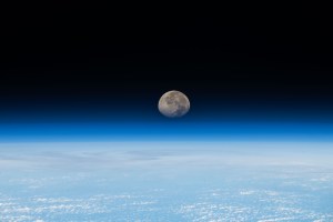 iss070e034014 (Nov. 30, 2023) -- A waning gibbous moon sets just beyond the horizon of Earth's atmosphere as the International Space Station soared 260 miles above the South Pacific Ocean.