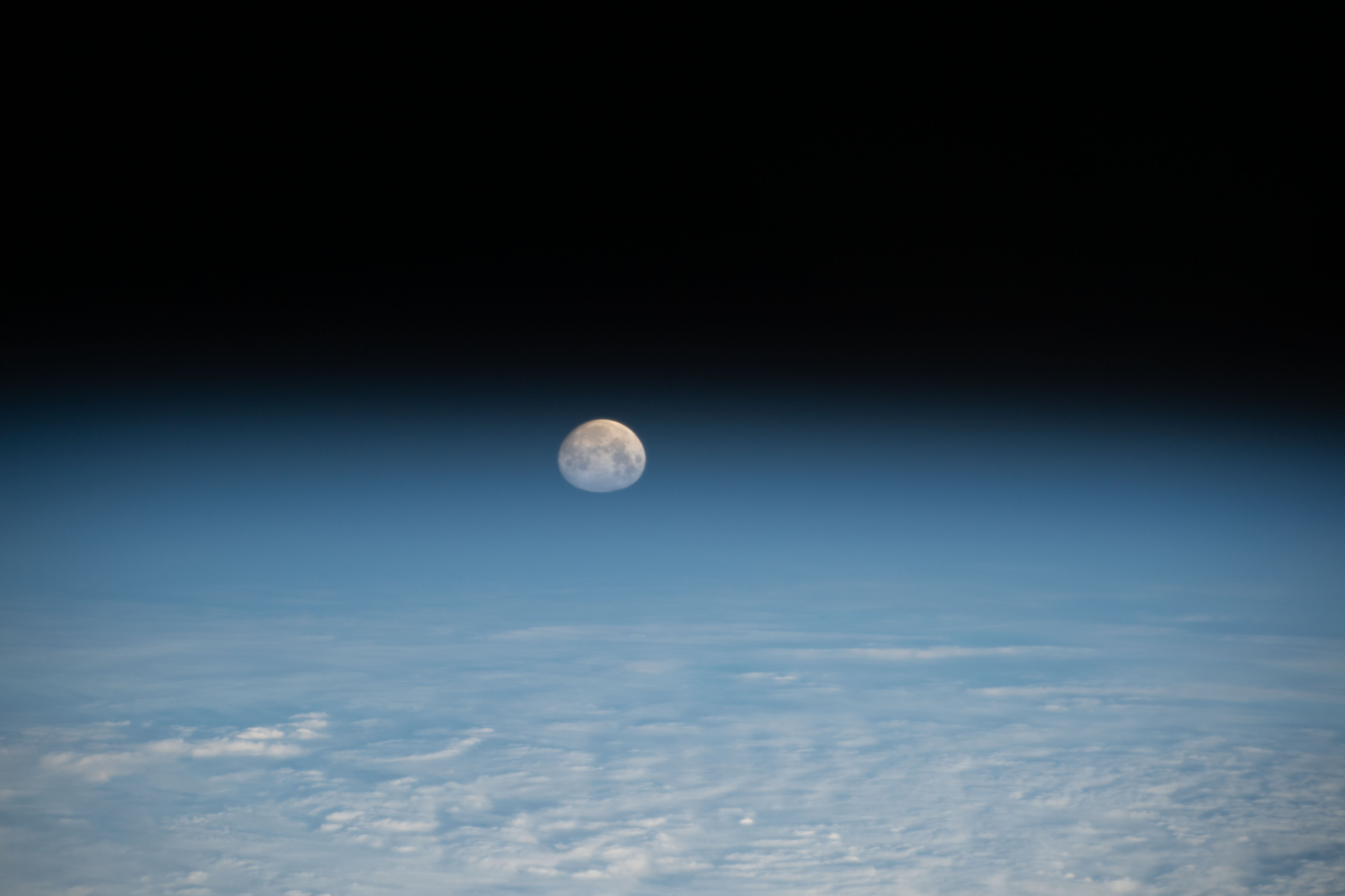 iss070e045463 (Dec. 25, 2023) -- A waxing gibbous moon rises above Earth's horizon as the International Space Station orbited 263 miles above the state of Utah.