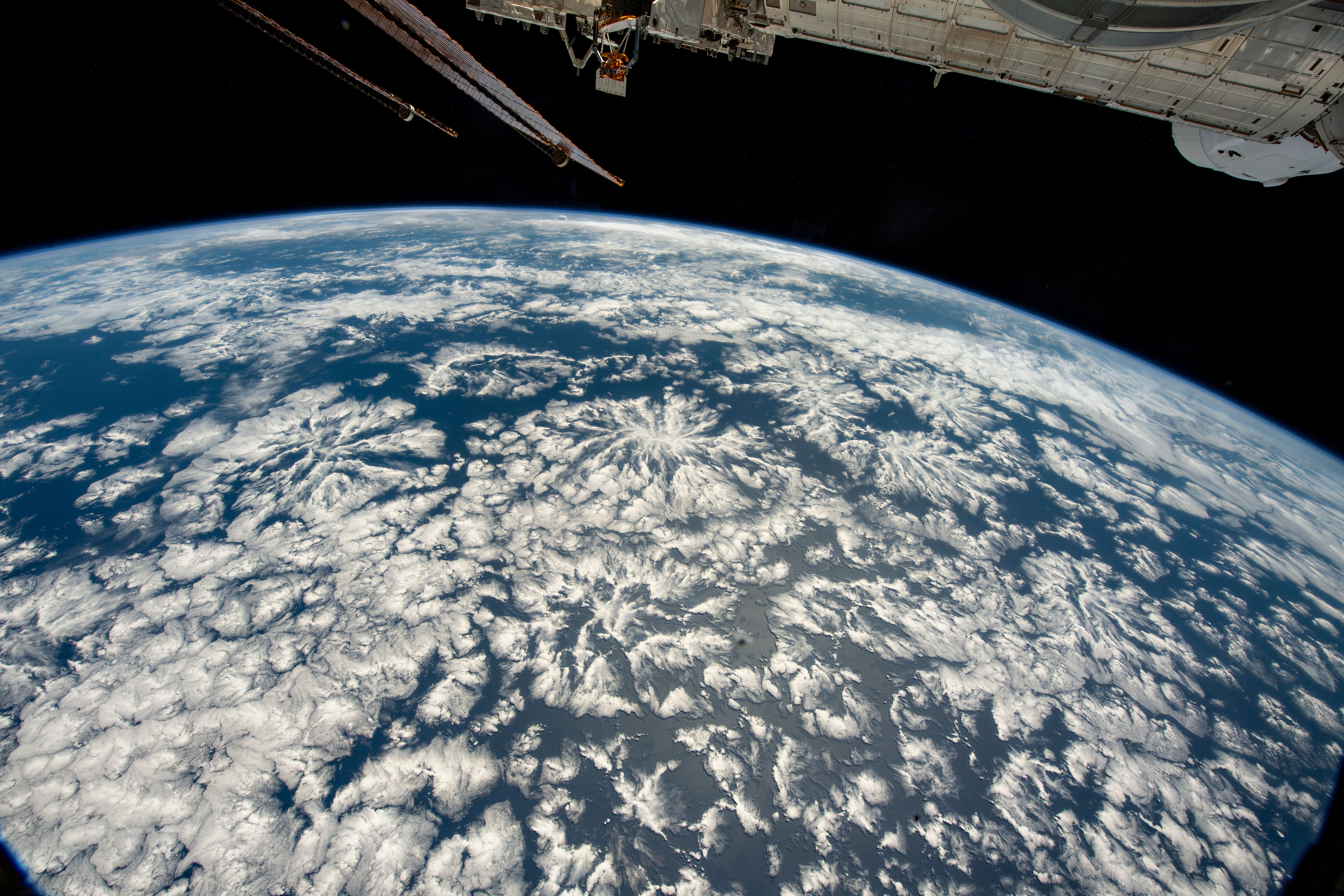 A partly cloudy Pacific Ocean is pictured from the International Space Station as it orbited 259 miles above off the coast of Peru in South America.